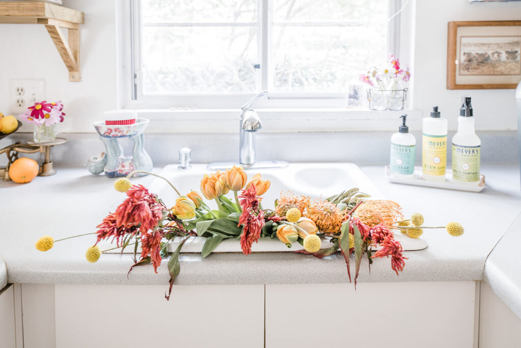 kitchen sink with flowers atlanta interior photography