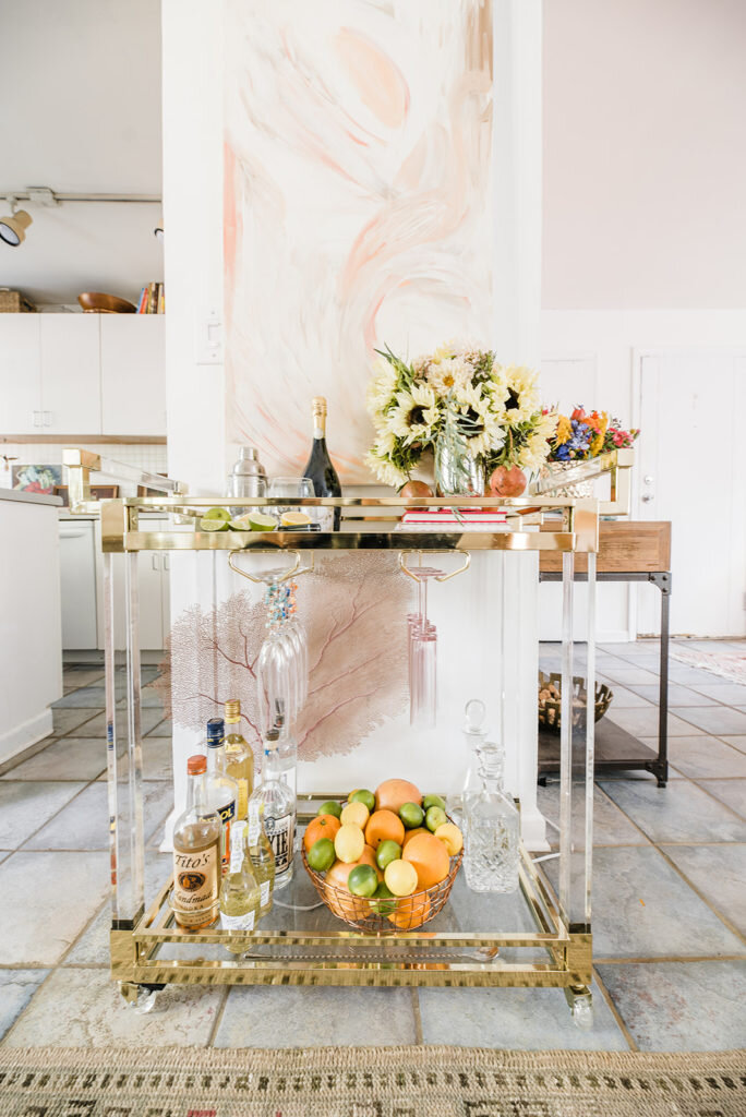 bar cart with fruit and flowers atlanta interior photography