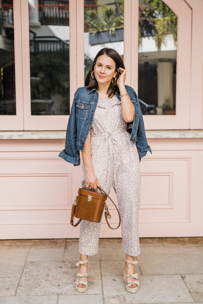 girl in jump suit on pink wall atlanta brand photographer