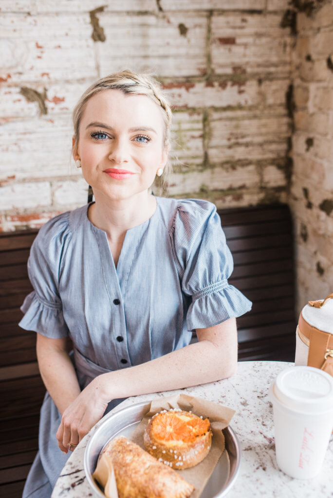 girl with pastry in coffee shop atlanta brand photographer hannah lozano